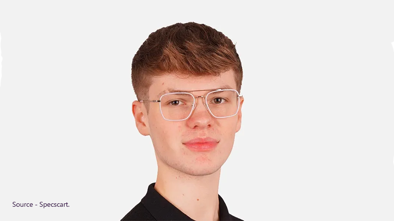 Male model in a black polo shirt wearing square metal frames with a white finish, suited for a trendy, casual look.