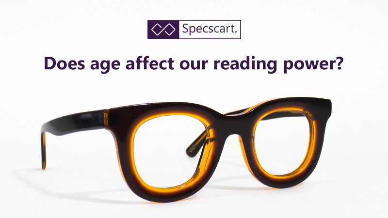 Thick-rimmed round glasses in a dark brown and amber tortoise-shell finish, set against a white background with the Specscart logo.