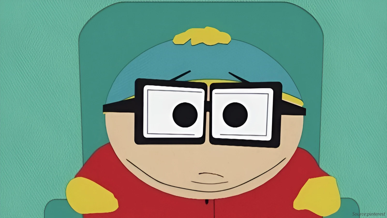 A cartoon close-up of Eric Cartman from South Park wearing a red shirt and a blue and yellow hat. He is depicted with oversized, square black and white eyeglasses.