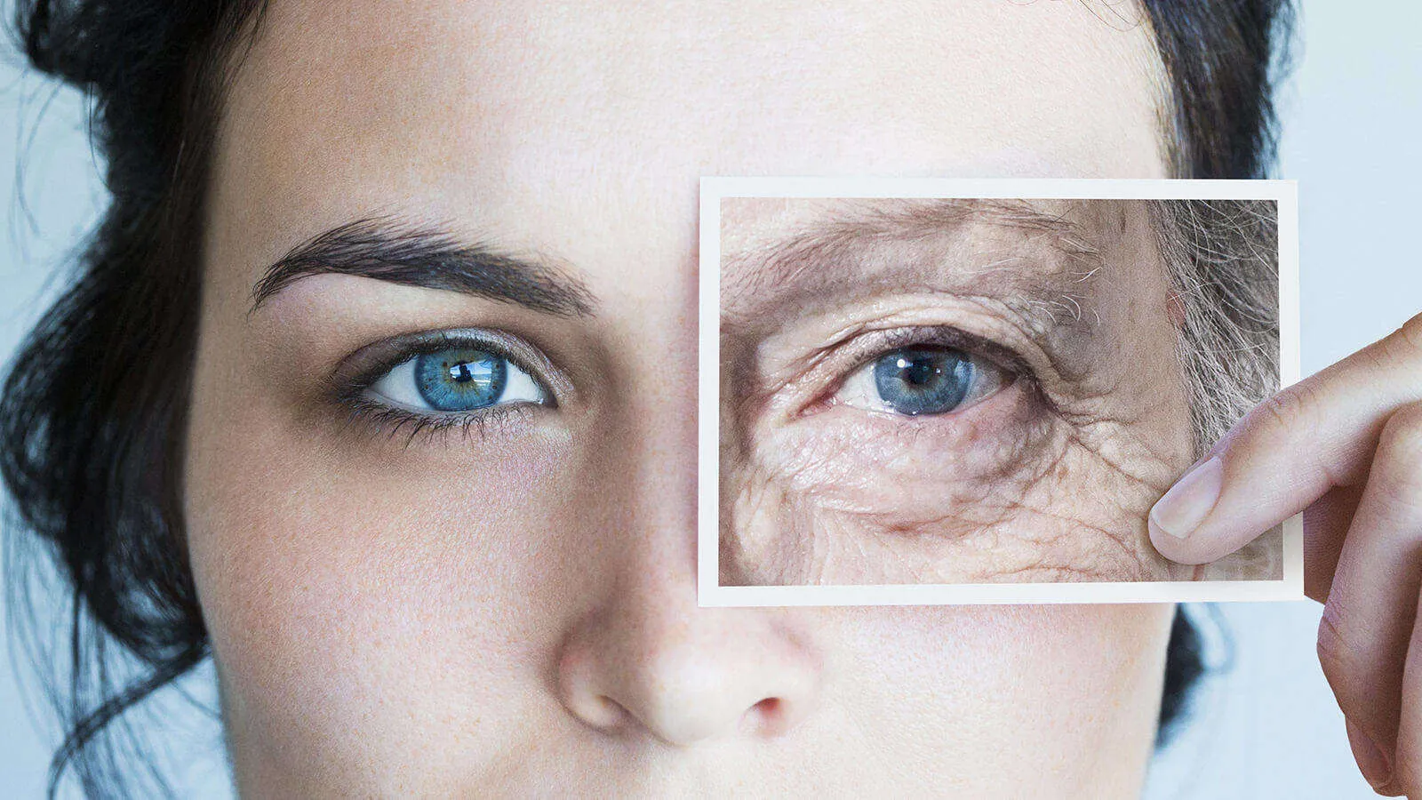 A split image of a woman's face with an overlay of wrinkled skin, illustrating how HEV light contributes to premature ageing around the eyes.