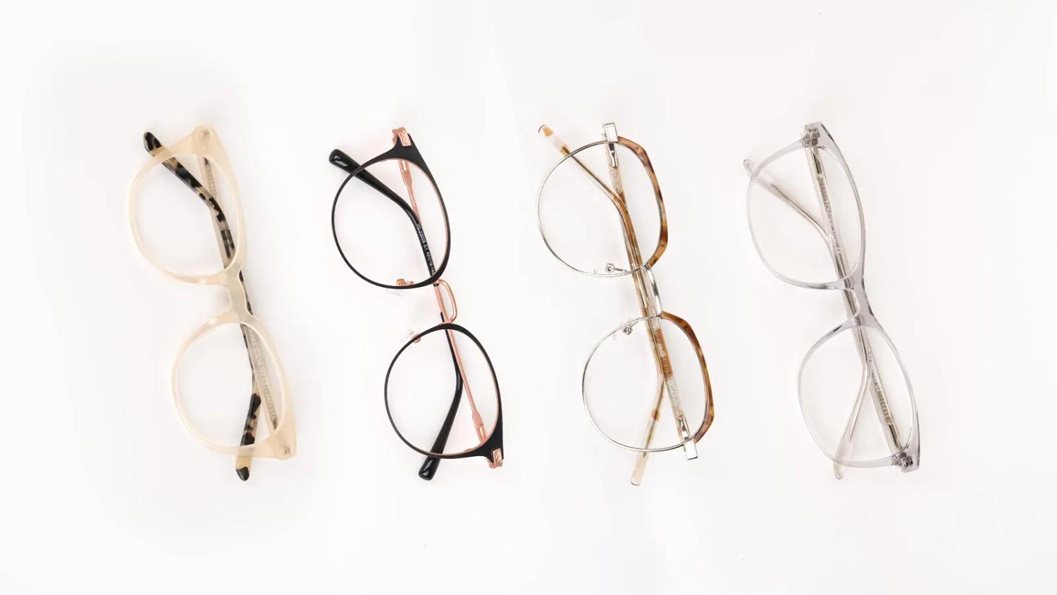 Hypoallergenic Glasses: A Guide to Skin-Friendly Frames Four different pairs of glasses, including clear, black, gold metal, and grey acetate frames, arranged vertically against a plain white background.