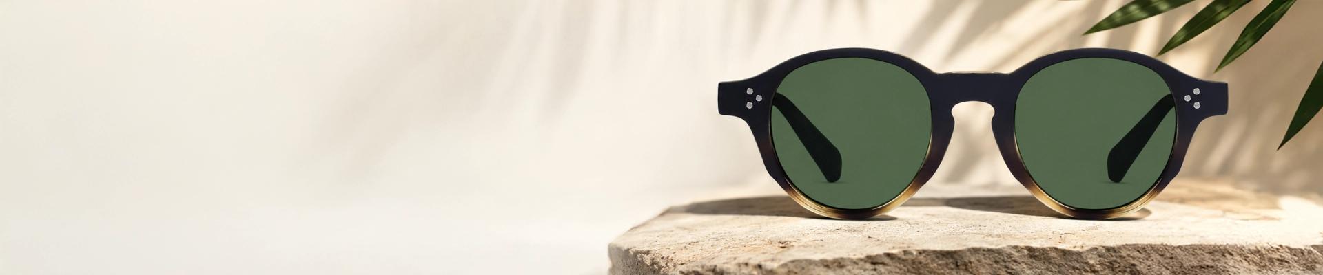 Keyhole Bridge Sunglasses Geometric black sunglasses with a distinctive keyhole bridge and white inner rim detail, featuring dark tinted lenses for a bold modern style.