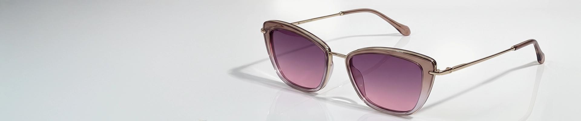 Pink Sunglasses A pair of classic silver-framed pilot sunglasses with soft pink-tinted lenses, displayed against a minimalist pastel pink gradient background.