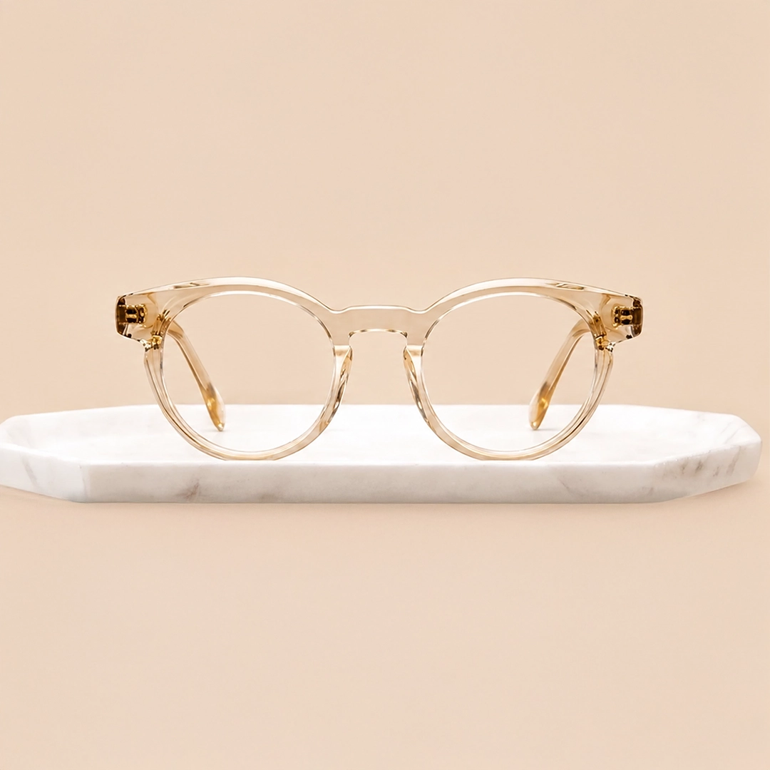 Oval Glasses Bold amber-coloured oval eyeglasses with thick round rims, displayed on a clean white background