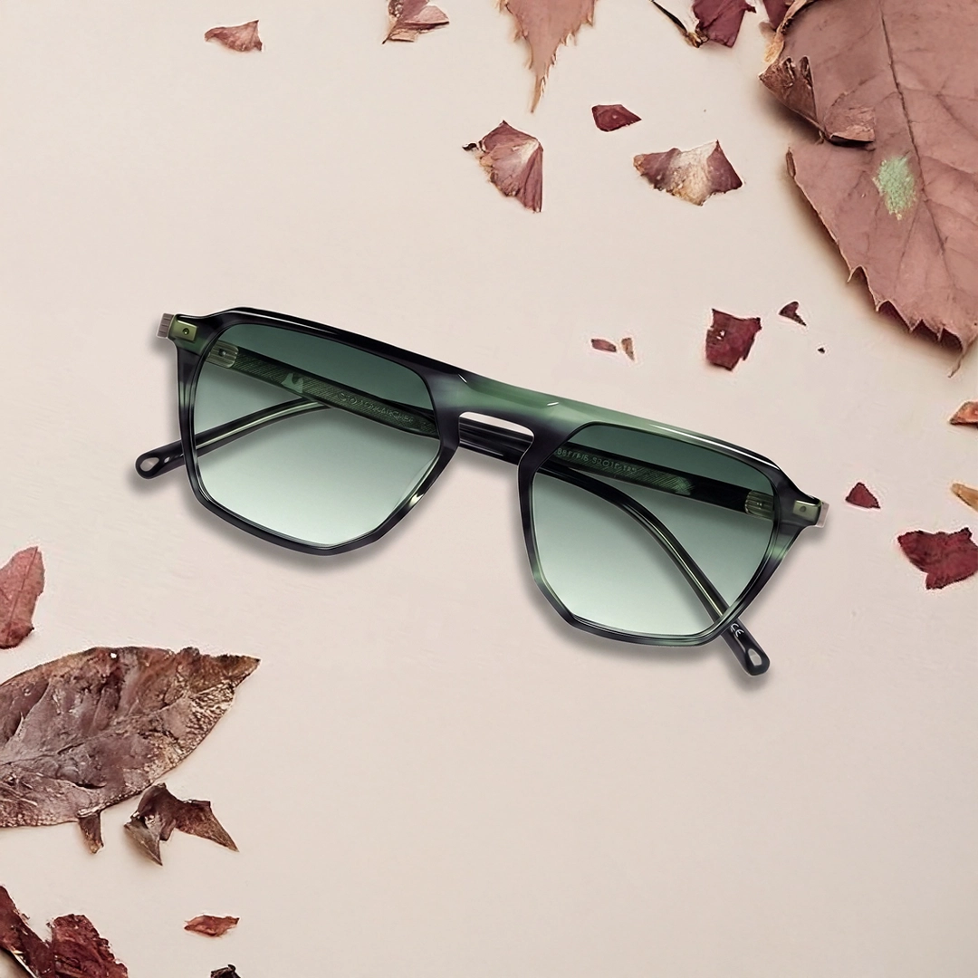 Green Sunglasses Vibrant neon green translucent round sunglasses with thick frames and dark lenses, casting a subtle reflection on a soft yellow gradient backdrop.