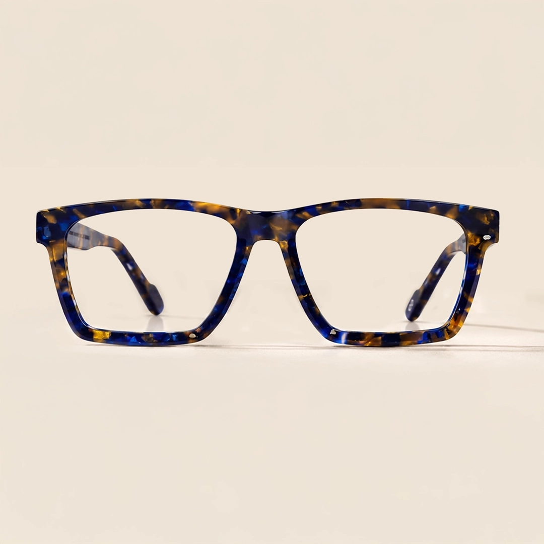 Square-shaped glasses with translucent olive green frames on a pale green background.