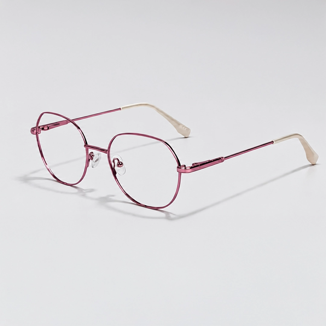 Elegant, vintage-style round glasses with thin, antique gold metal frames and tortoiseshell accents on the temples.