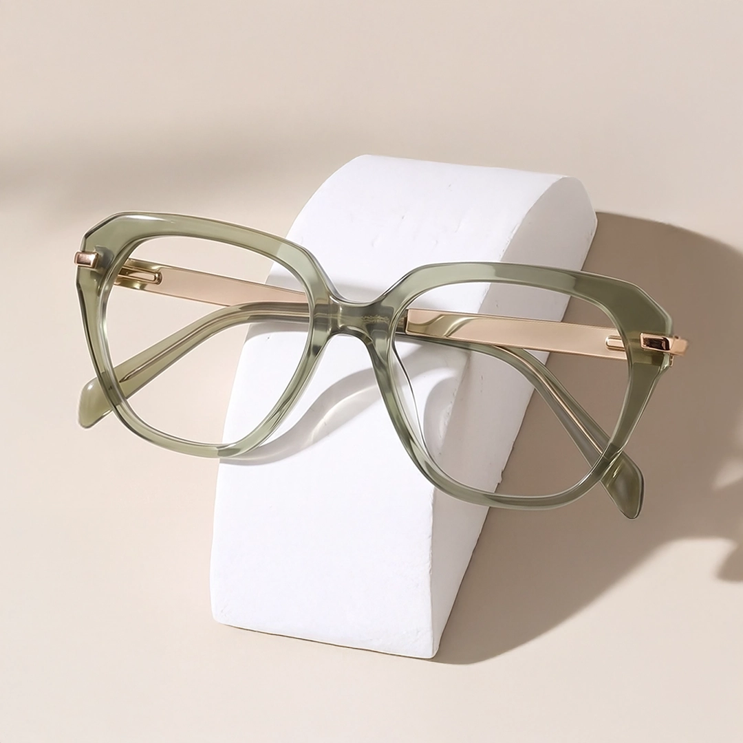 Green Glasses The image features a pair of green eyeglasses with black and tortoiseshell temples. It has a rectangular shape and is placed over a white stand against a light green background. It also has text saying Green Glasses, discount offer and Trustpilot Reviews.