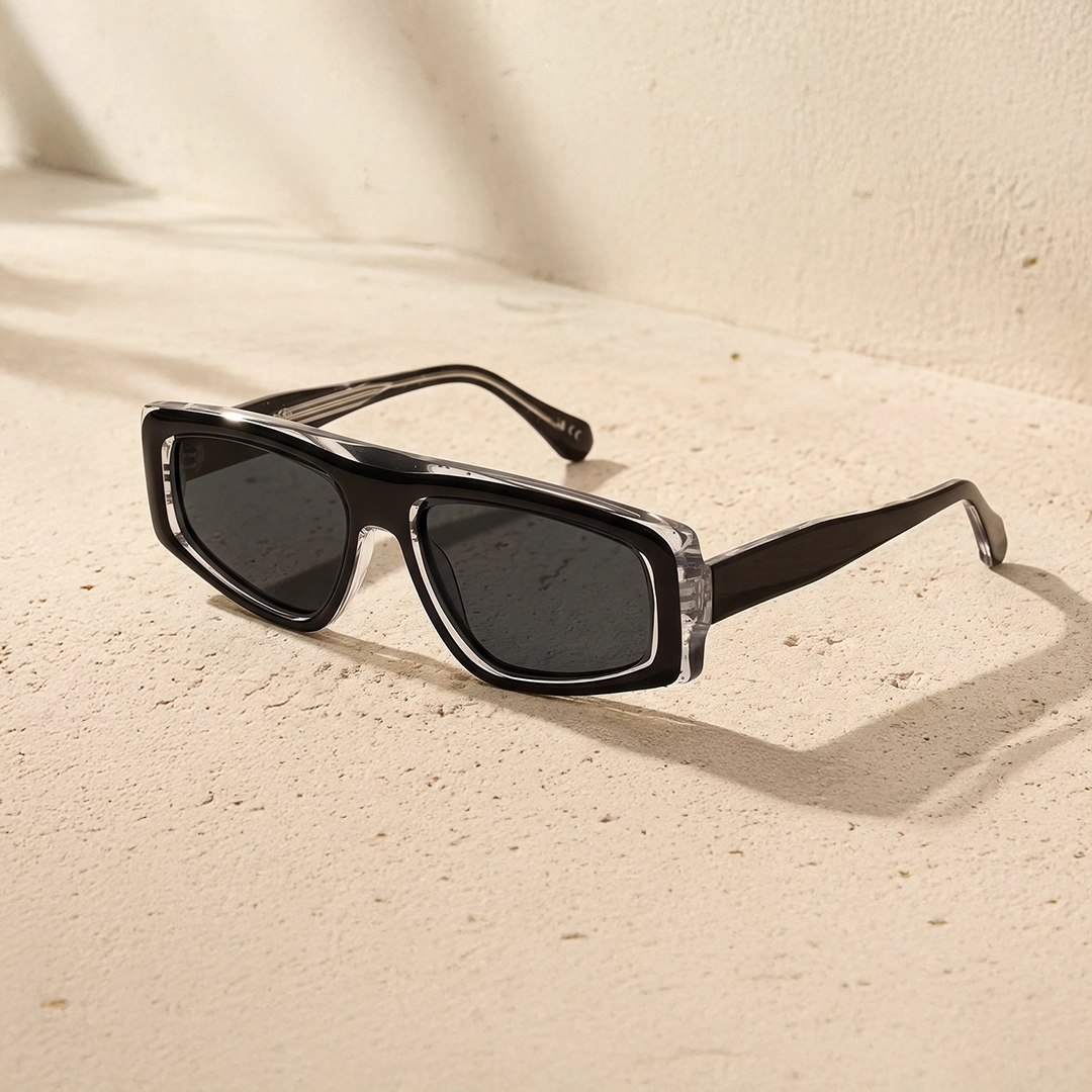 Sleek silver metal flat top sunglasses with dark tinted lenses and thin temples, displayed against a minimalist white background for a modern look.