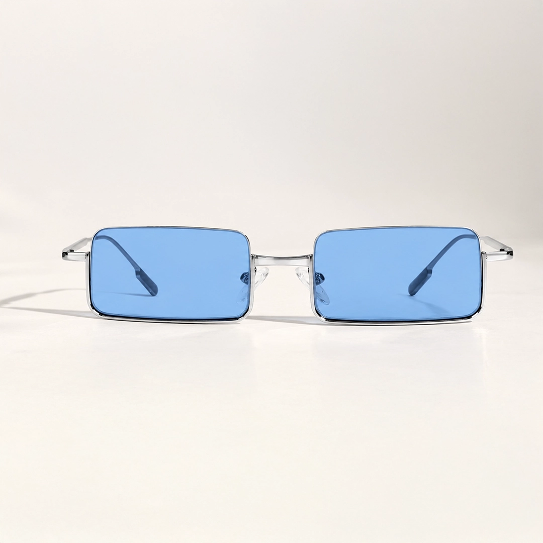 Silver Sunglasses A pair of lightweight silver sunglasses with blue-tinted lenses, displayed at an angle to highlight the sleek metal frame and minimalist design.