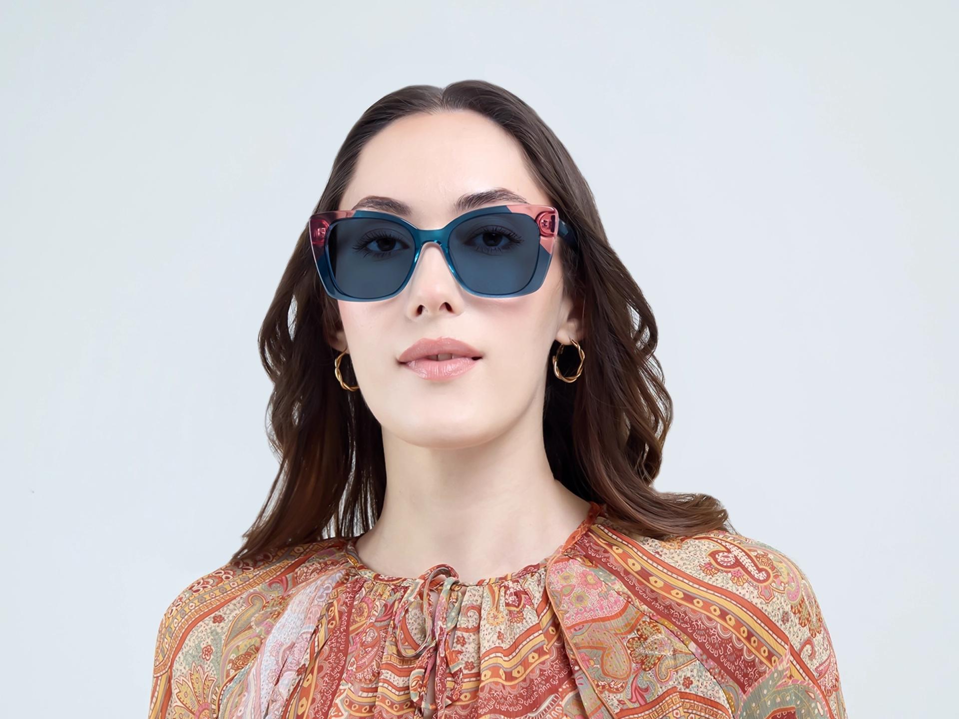 Crystal Teal Butterfly Frame With Dark Blue Sunglasses