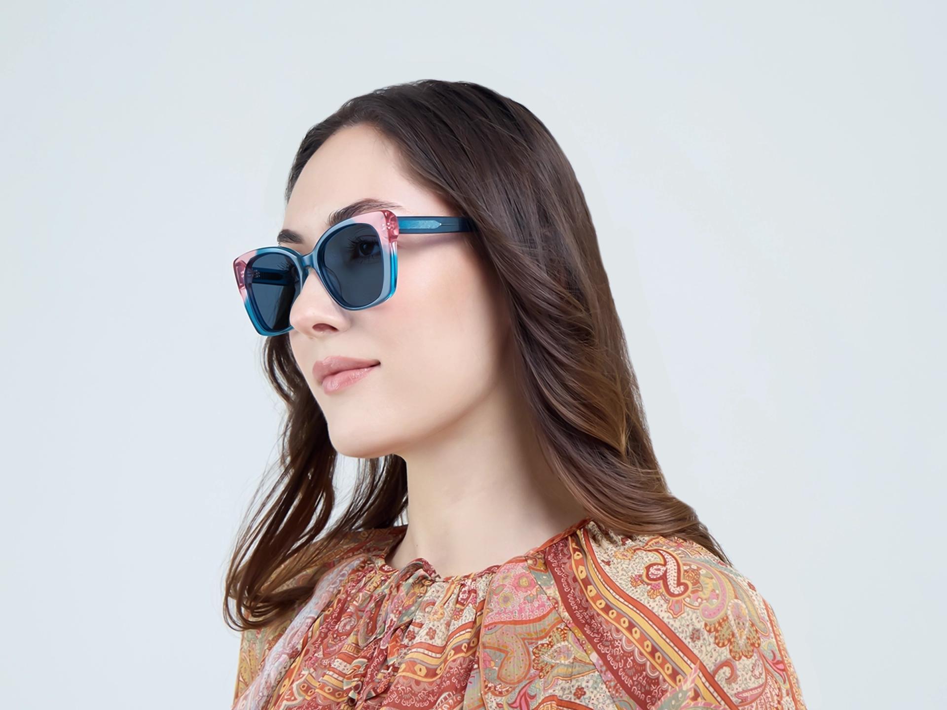 Crystal Teal Butterfly Frame With Dark Blue Sunglasses