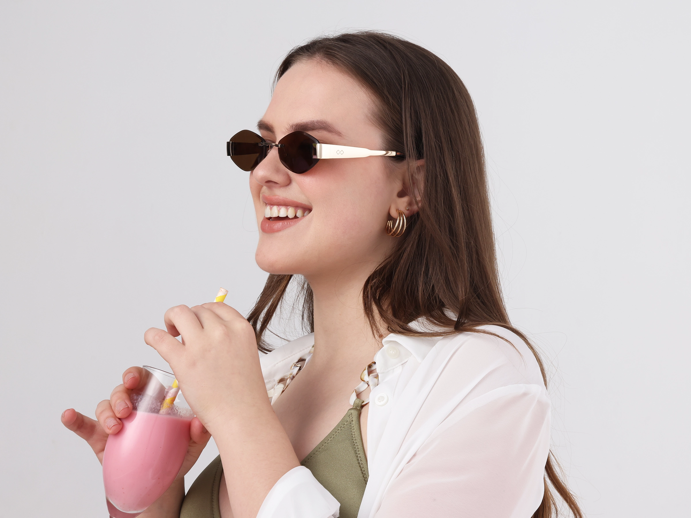Champagne Gold Oval Rimless Sunglasses