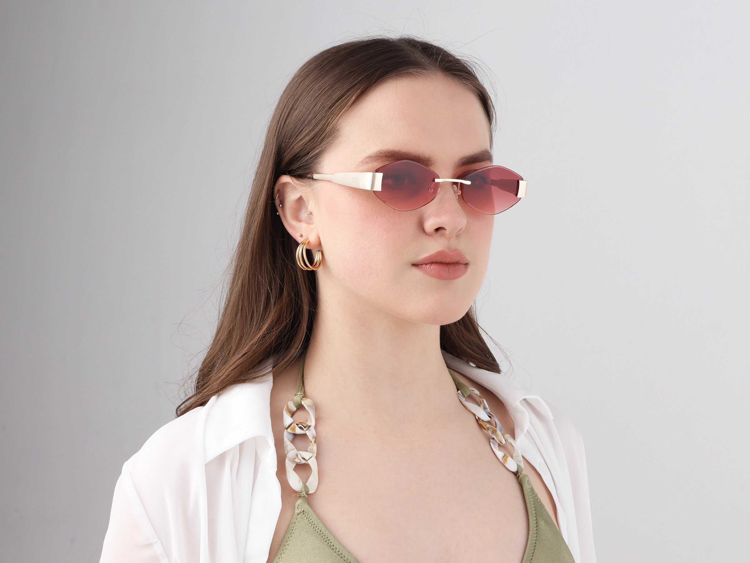 Champagne Gold Rimless Geometric Sunglasses