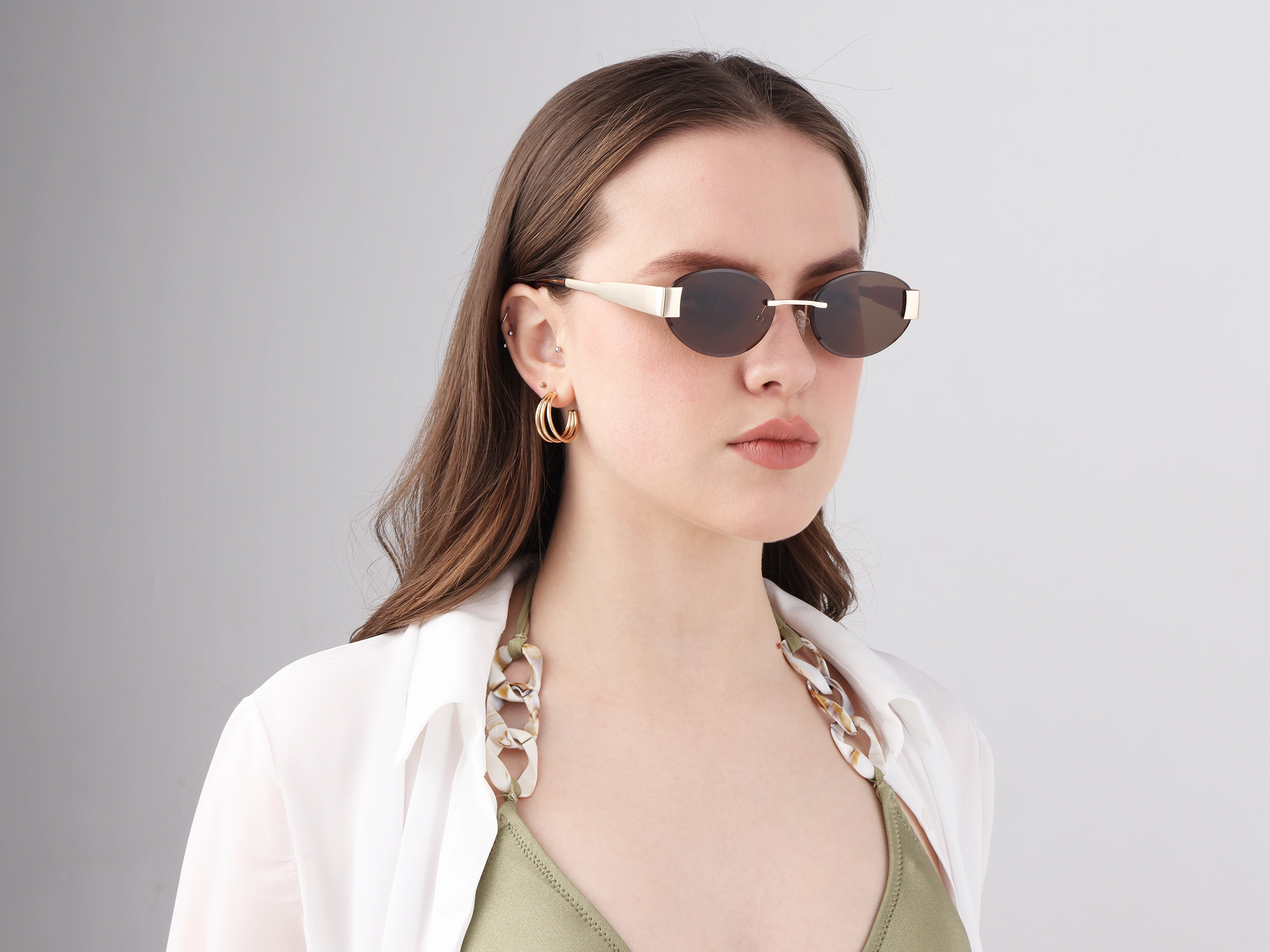 Oval Rimless Sunglasses With Brown Tint