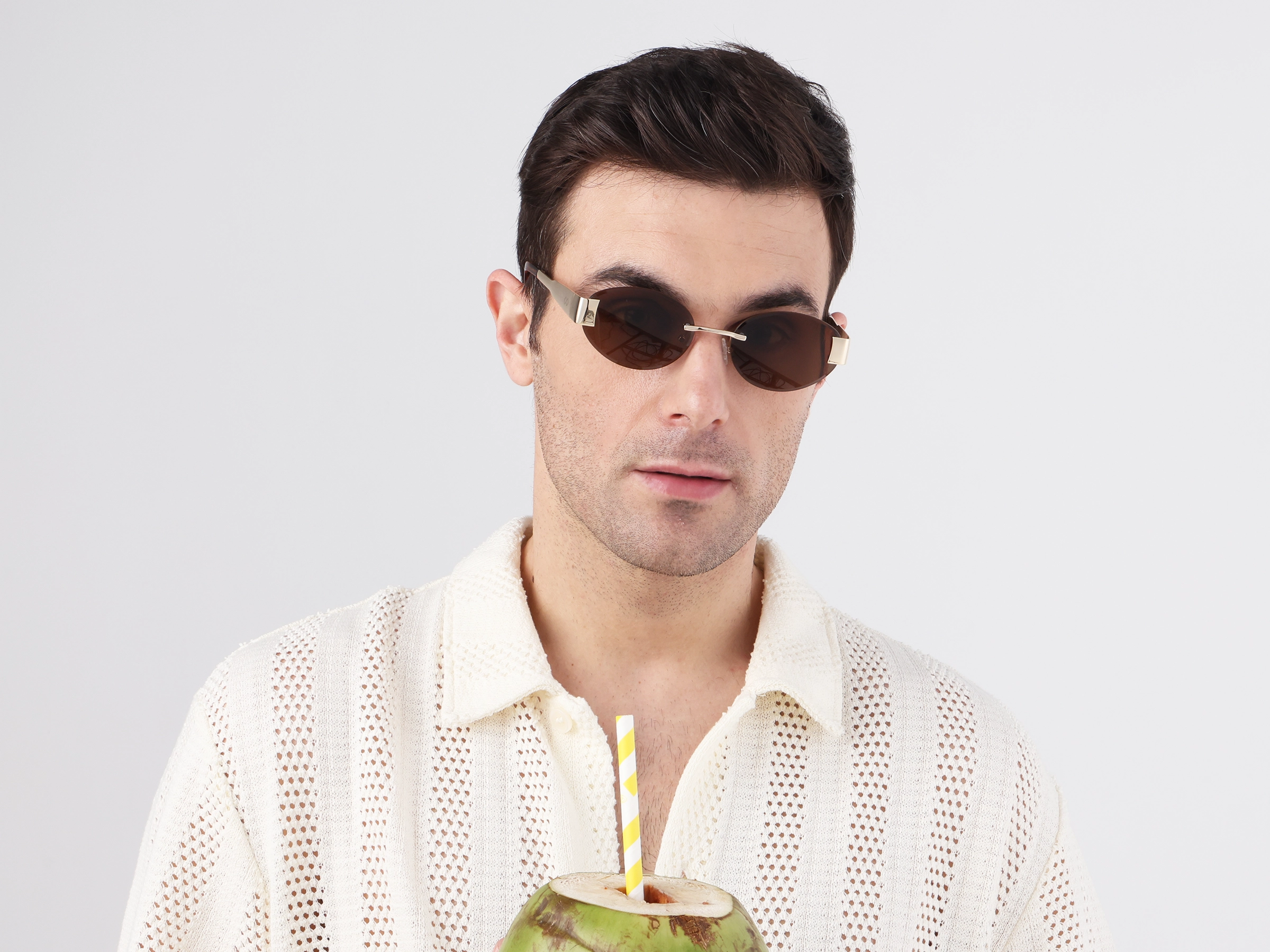 Oval Rimless Sunglasses With Brown Tint