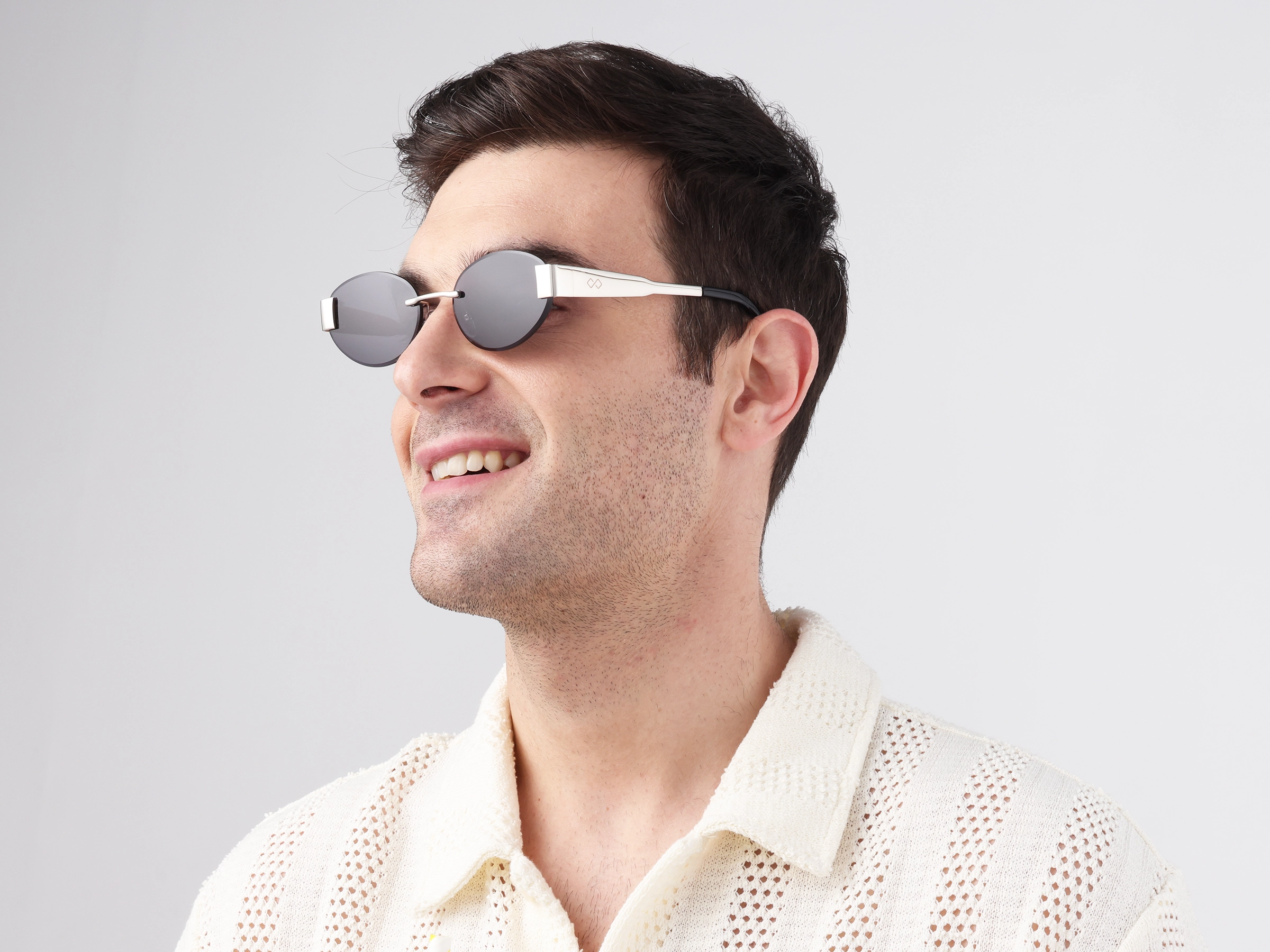 Oval Silver Rimless Sunglasses With Blue Tint