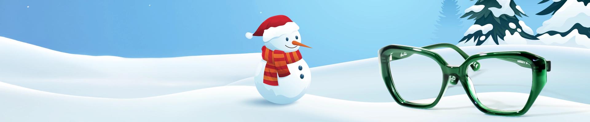 Christmas Glasses Festive winter banner with a snowman in a Santa hat and a pair of large, emerald green Specscart glasses lying in the snow.