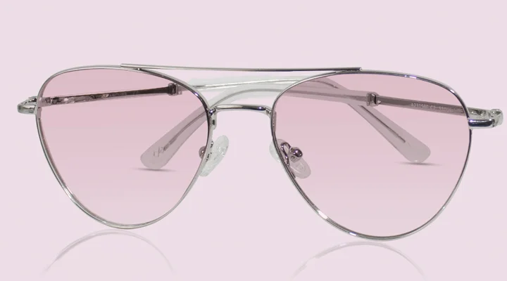 Pink Sunglasses A pair of classic silver-framed pilot sunglasses with soft pink-tinted lenses, displayed against a minimalist pastel pink gradient background.