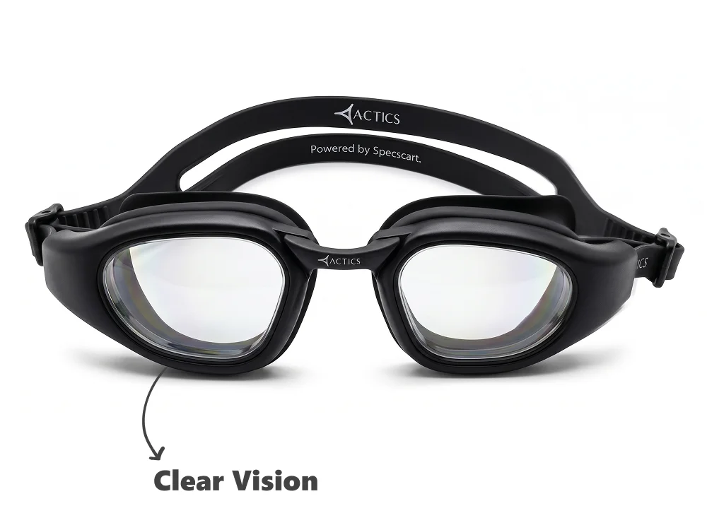 Front view of black Actics swimming goggles by Specscart on a white background, with an arrow pointing to the clear lens labeled "Clear Vision"