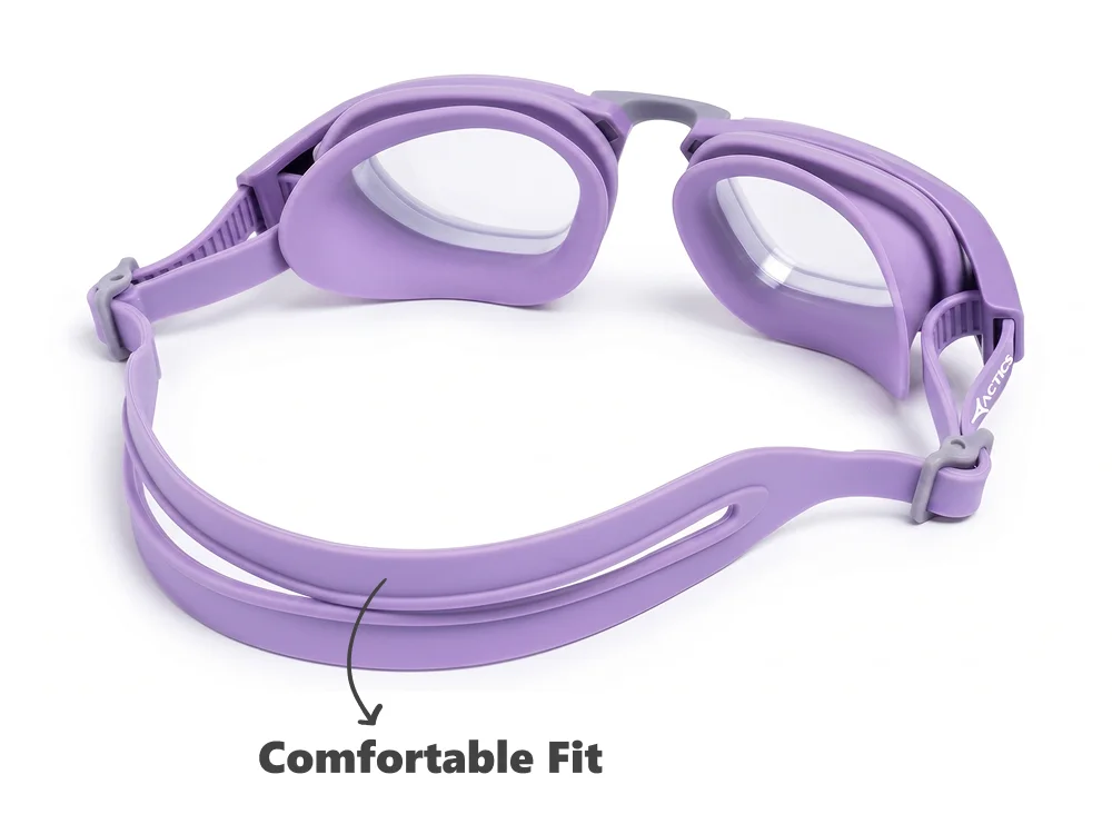 Purple Actics swimming goggles on a white background, with an arrow pointing to the flexible split head strap labeled "Comfortable Fit".